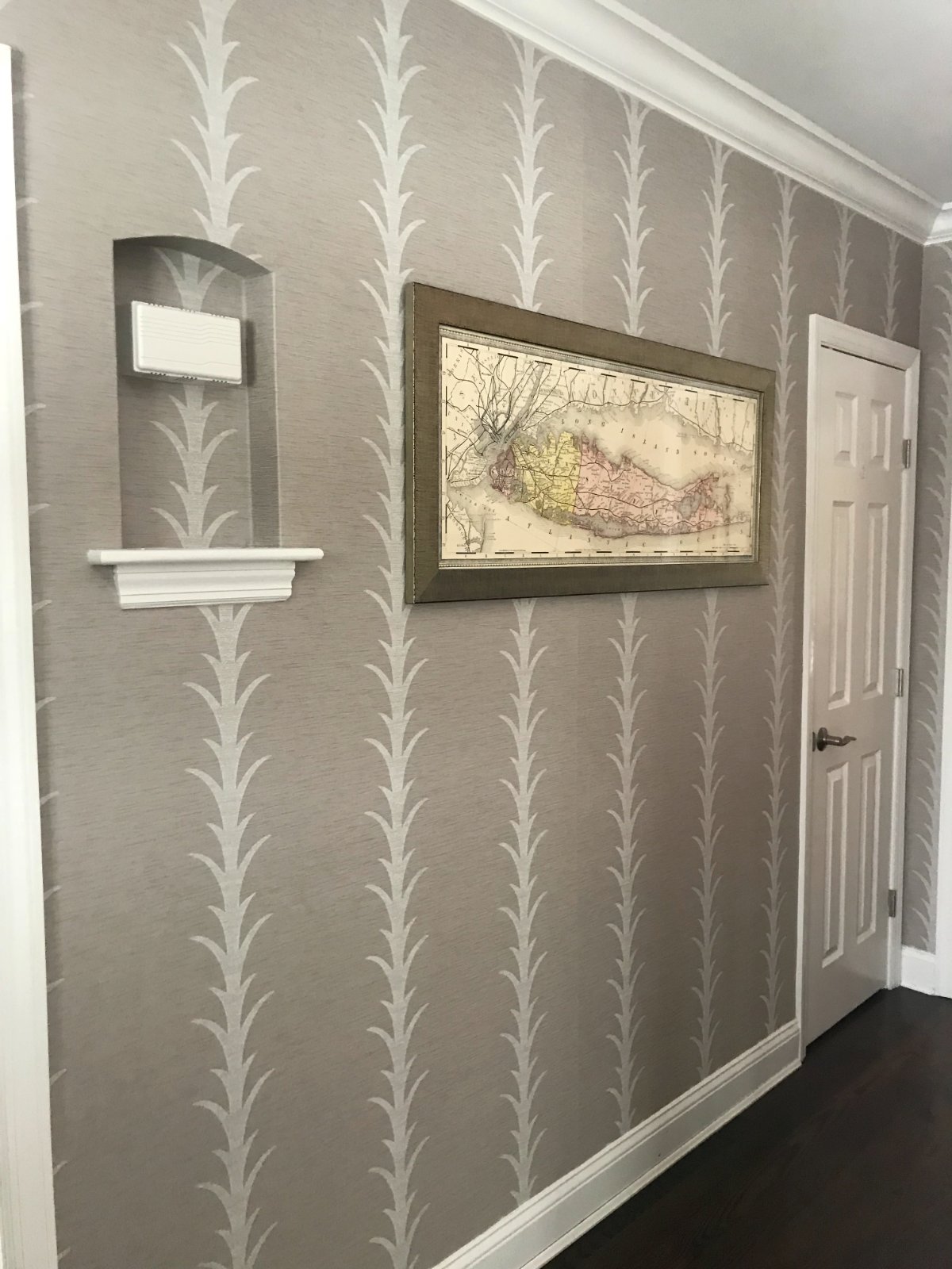 Grasscloth wallpaper in an entry hall
