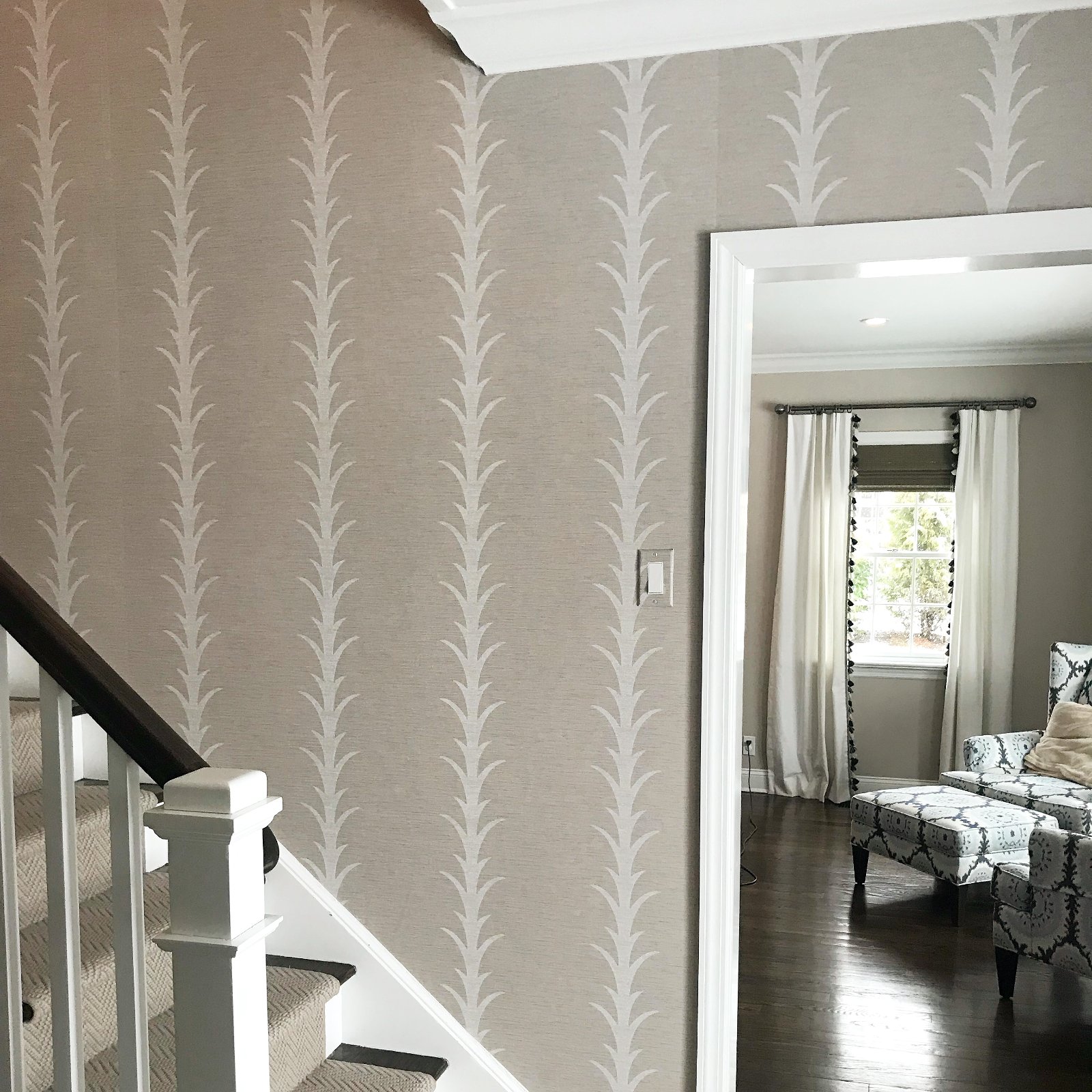 Acanthus stripe wallpaper on a curved stair
